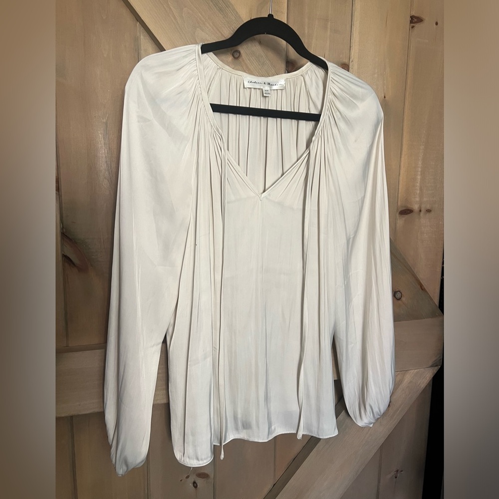 Chelsea & Theodore cream silky top in size medium. Like new. Worn once
